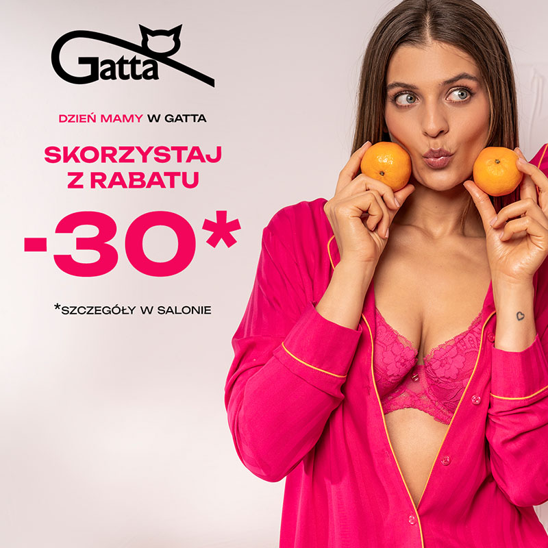 Grafika promocyjna marki Gatta przedstawia kobietę ubraną w intensywnie różową piżamę i koronkową bieliznę w tym samym kolorze. Modelka trzyma przy twarzy dwie mandarynki i pozuje na jasnym tle. Na grafice widoczny jest napis „Dzień Mamy w Gatta” oraz informacja o rabacie „-30%”. W lewym górnym rogu znajduje się logo marki Gatta.